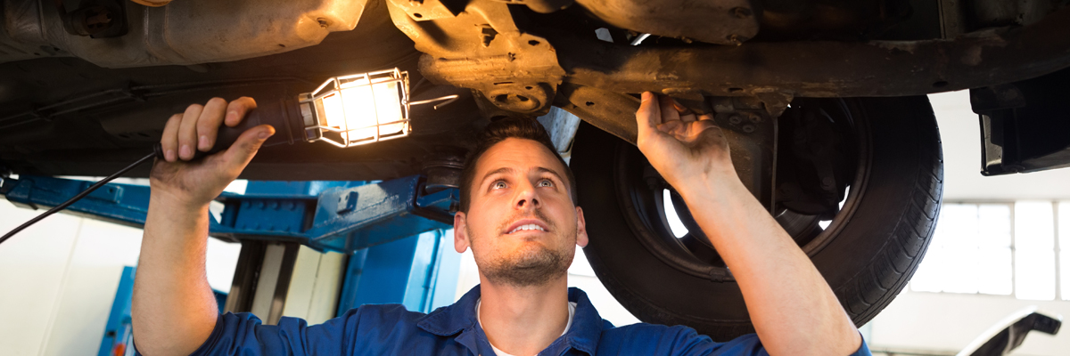 Mechanic servicing a vehicle - Car Service Pewsey